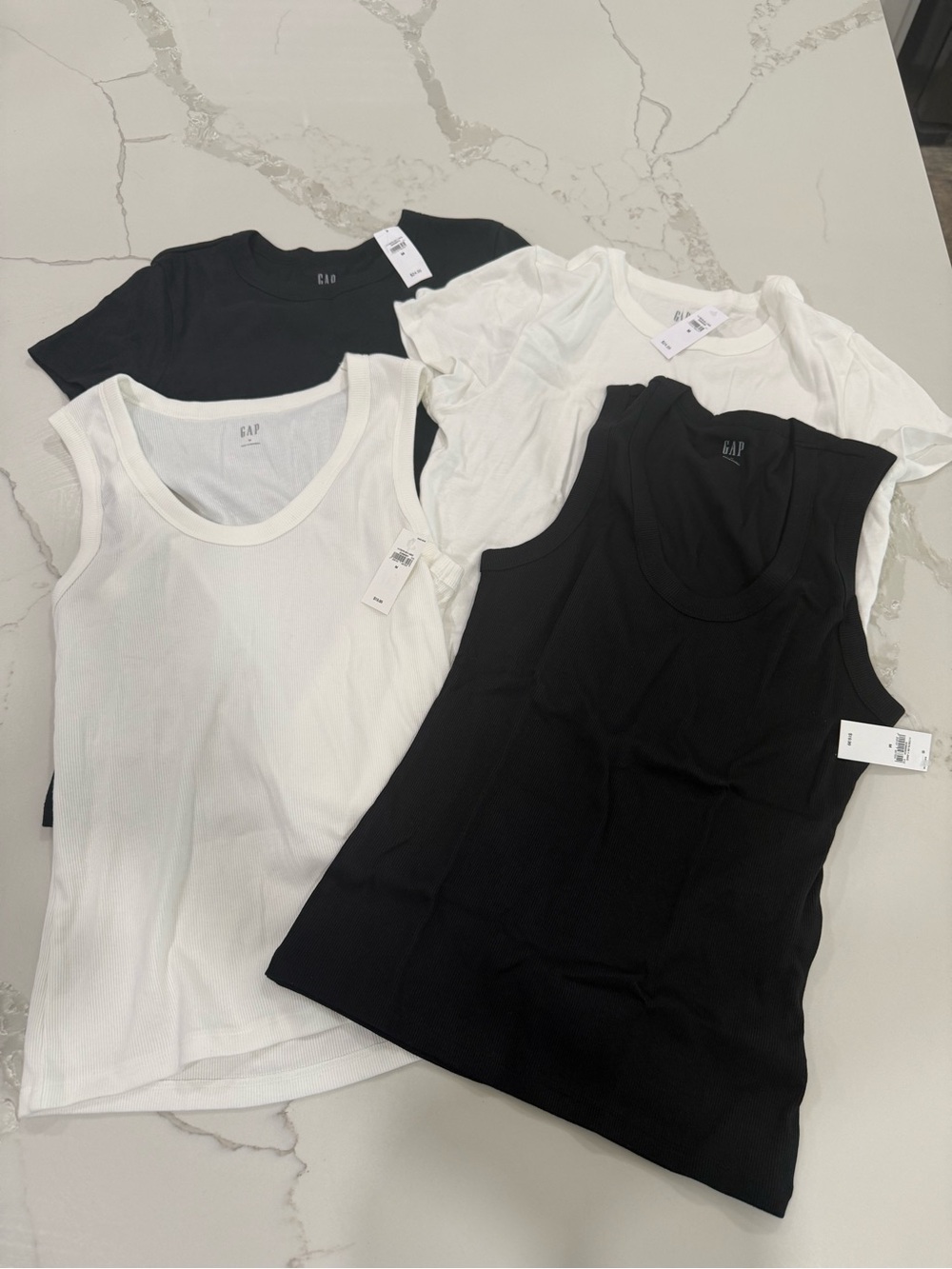 Two Gap scoop neck tanks in black and white